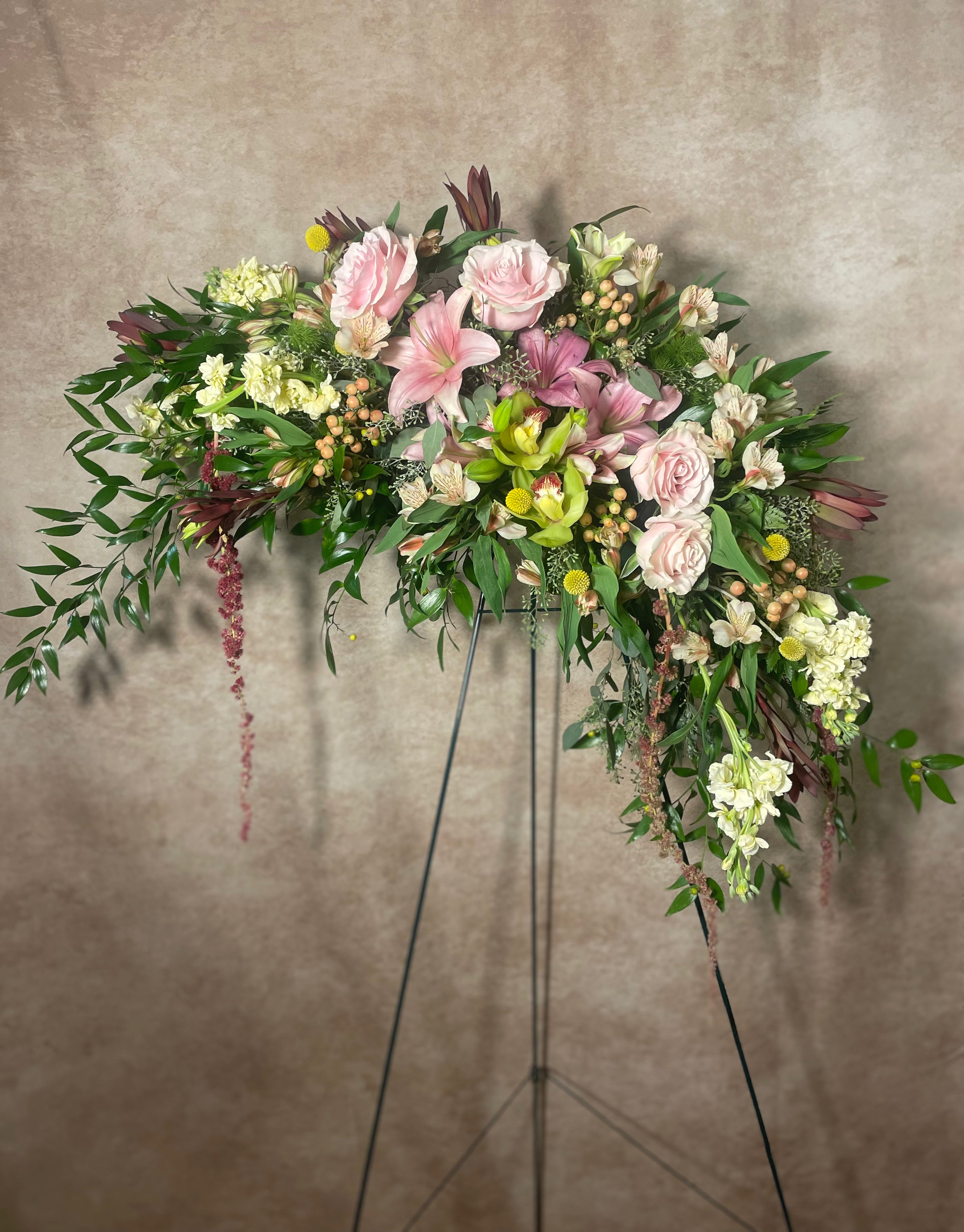 Whispers of Wildwood Easel Spray–Rembrandt Florist At Restland